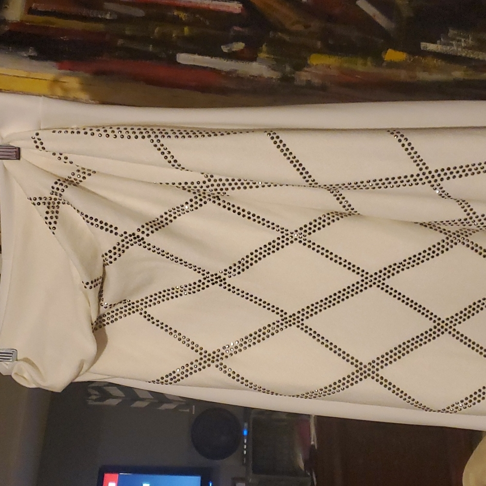 Two piece cape and bell bottom pants